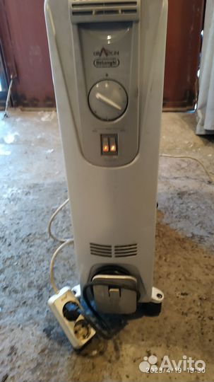 Масляный обогреватель delonghi