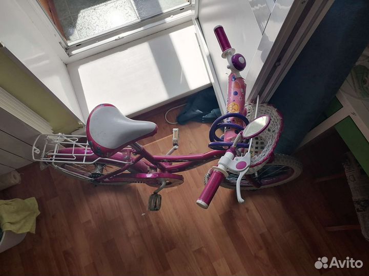 Продам детский велосипед с боковыми колесами