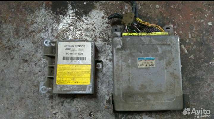 Блок управления двигателем Мазда 323 BA