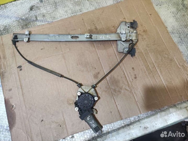 Передний левый стеклоподъёмник Grand Starex 2010