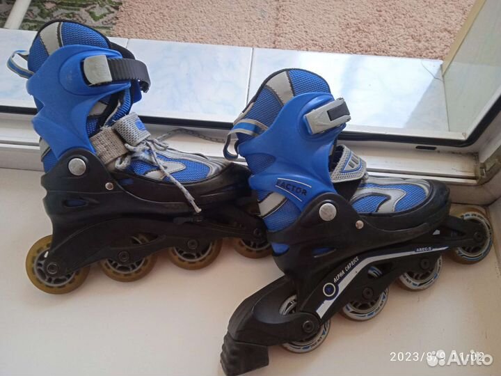 Коньки роликовые