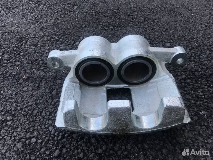 Суппорт тормозной передний левый Transit 1521150