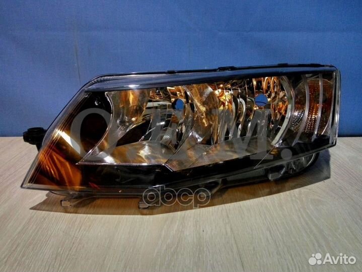 Фара левая Skoda Octavia 001282321002052017