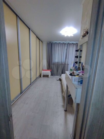 Доля в 2-к. квартире, 65 м², 5/9 эт.