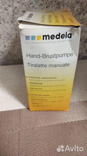 Молокоотсос ручной medela