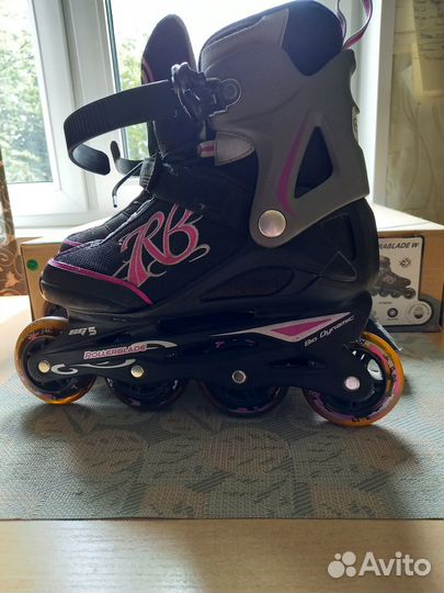 Роликовые коньки