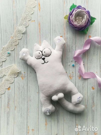 Кот на присосках