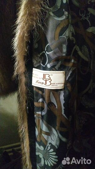 Шуба из меха енота