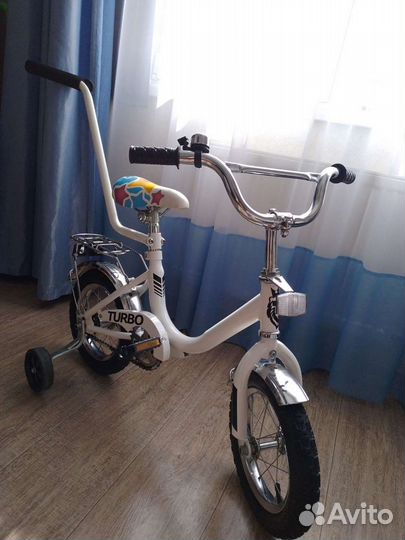 Детский велосипед с ручкой