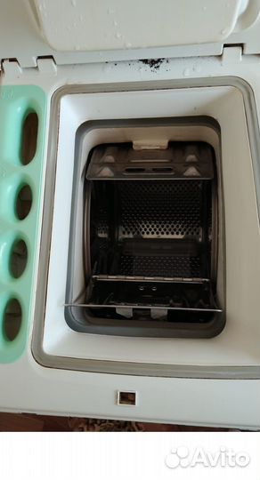 Стиральная машина с вертикальной загрузкой Indesit