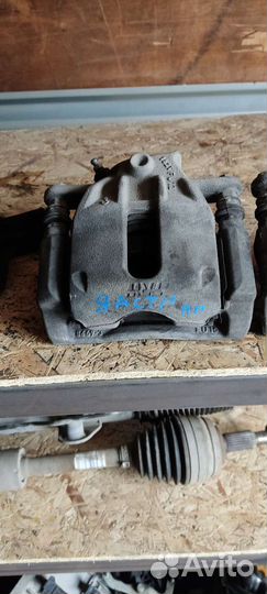 Суппорт передний Nissan Terrano Renault Daster