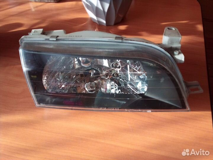 Фара Toyota Corolla 100 правая черный хрусталь