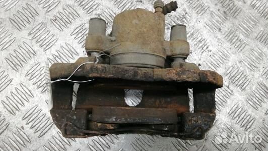 Суппорт тормозной передний правый mazda 3 1 (HEA38