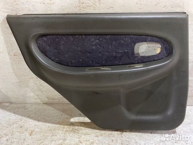 Обшивка боковой двери задняя левая Kia Spectra