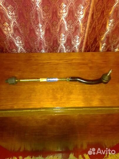 Рулевая тяга с рулевым наконечником левый