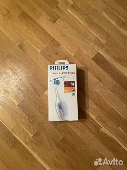 Электрическая зубная щетка philips новая