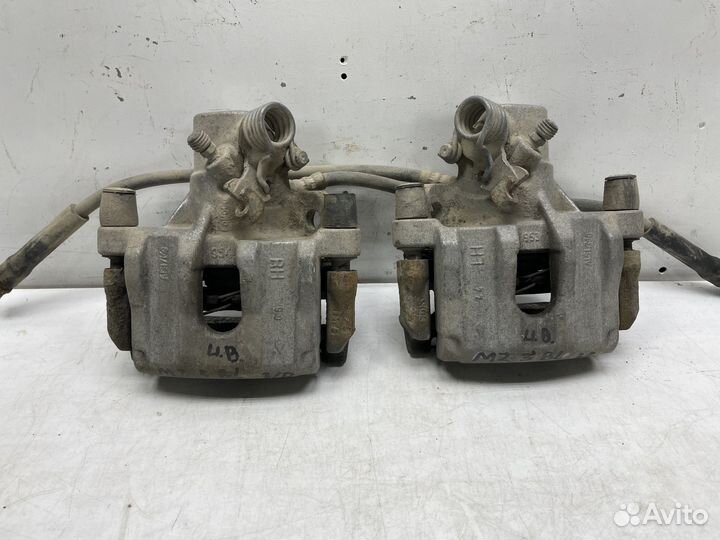 Суппорт задний левый / правый Mazda 3 BL 1.6