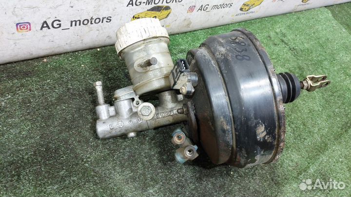 Вакуумник тормозной Mitsubishi Carisma I