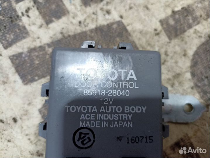 Блок управления дверьми передний Toyota Estima 2