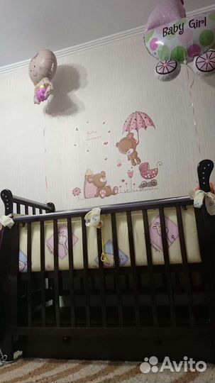 Детская кроватка с маятником и ящиком