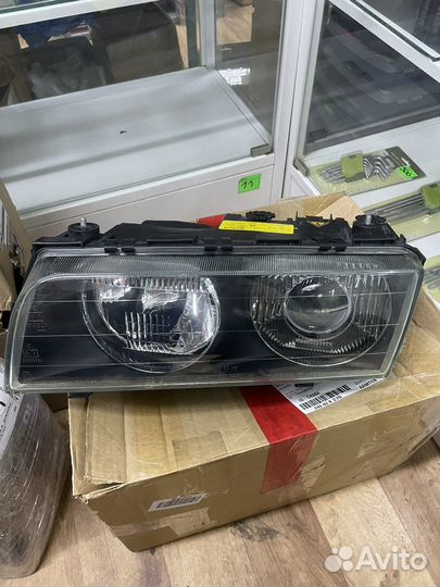Фара ксеноновая левая Bmw E38