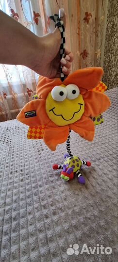 Игрушка на коляску