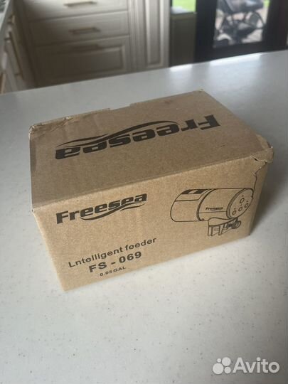 Кормушка для рыб автоматическая