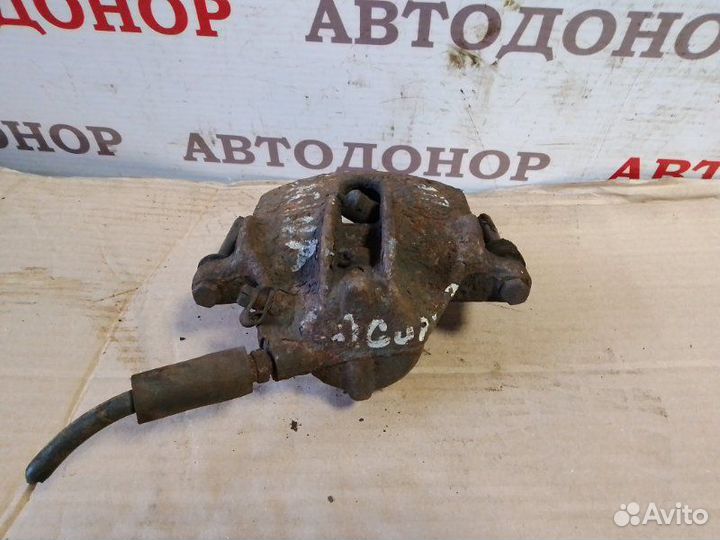 Суппорт тормозной передний левый Renault Laguna