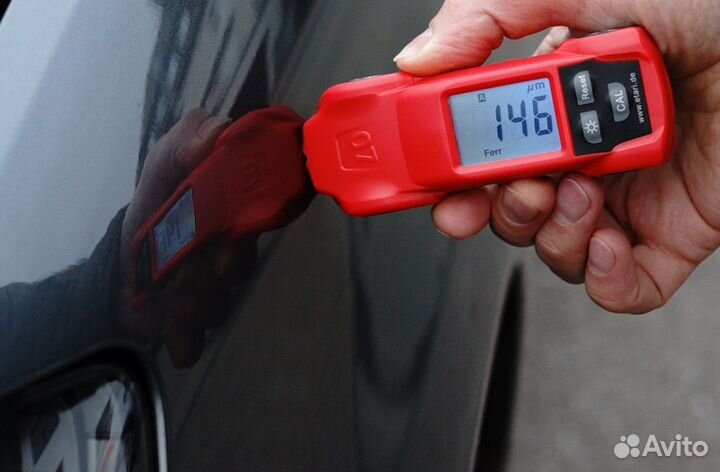 Проверка кузова Honda на стапеле, толщиномером