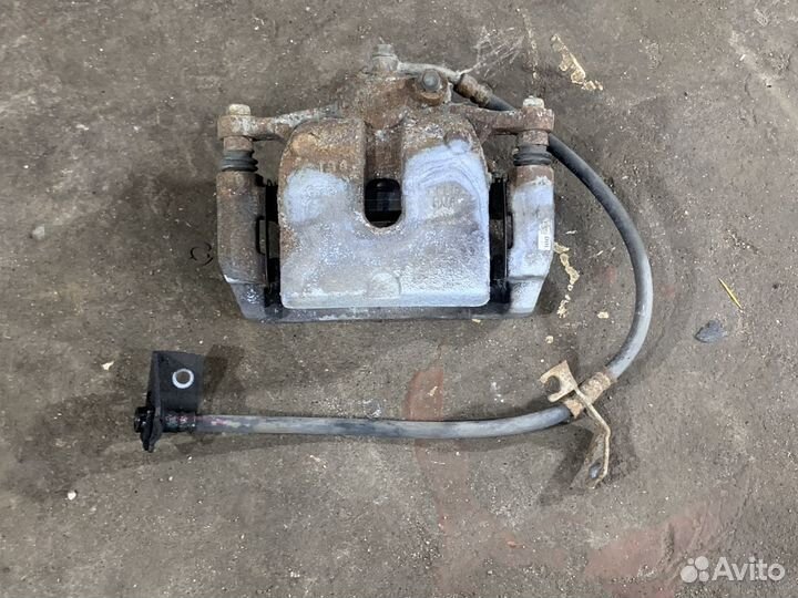 Суппорт передний левый KIA K5 DL3