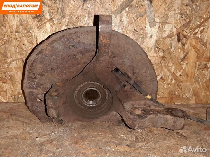 Кулак передний левый Mitsubishi Lancer 10