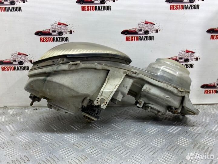 Фара галогеновая передняя левая Kia Shuma лифтбек