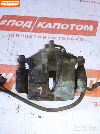 Суппорт тормозной передний левый Hyundai ix35 2012