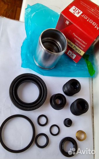 Ремкомплект заднего суппорта Ауди 100 80 с поршнем