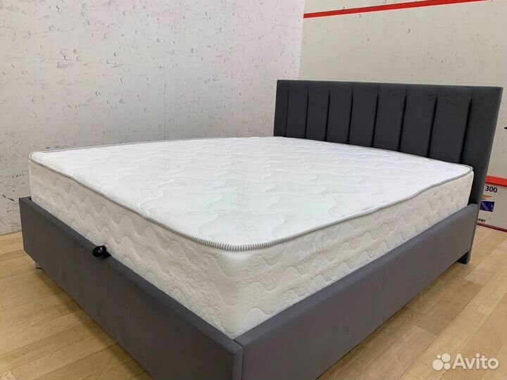 Кровать с подъемным механизмом