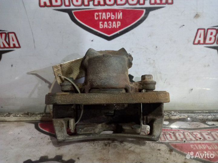Суппорт тормозной передний левый Daihatsu Terios