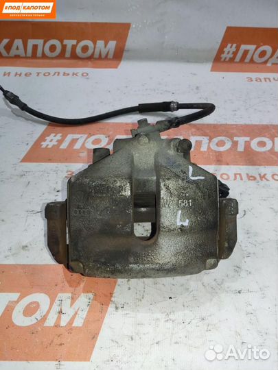 Суппорт тормозной передний левый seat Leon 2 рест