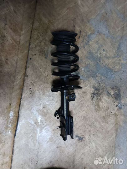 Стойка передняя левая Nissan X-treil