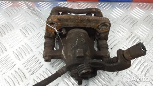 Суппорт тормозной задний правый KIA CEE'D 2 (JD)