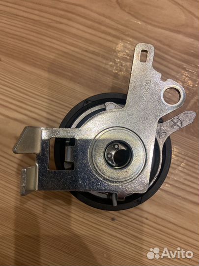 Новый ролик натяжителя грм