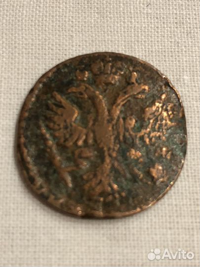 Деньга 1734 перечекан из копейки 1724