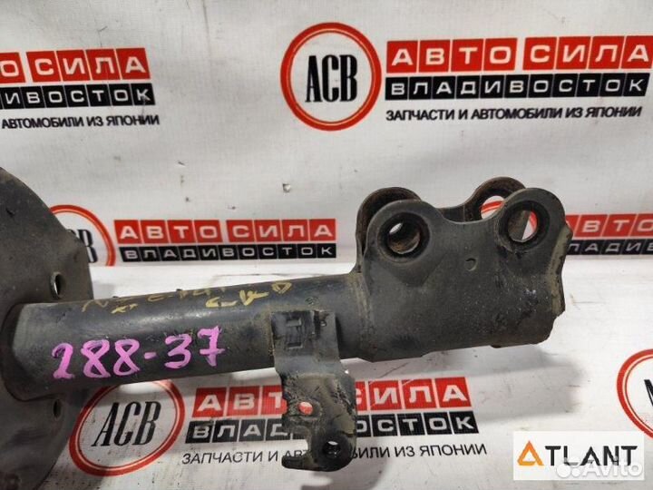 Стойка передняя левая toyota corolla fielder