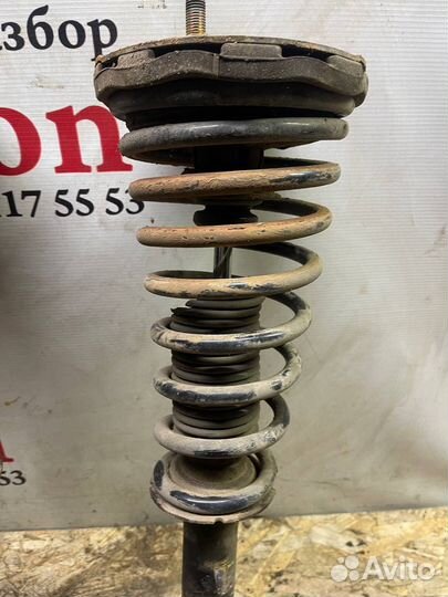 Передняя стойка амортизатор левая Primera P10