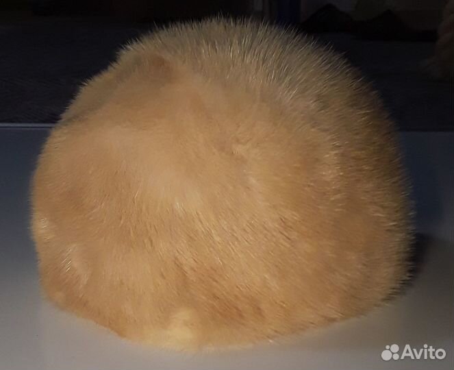 Женские меховые шапки