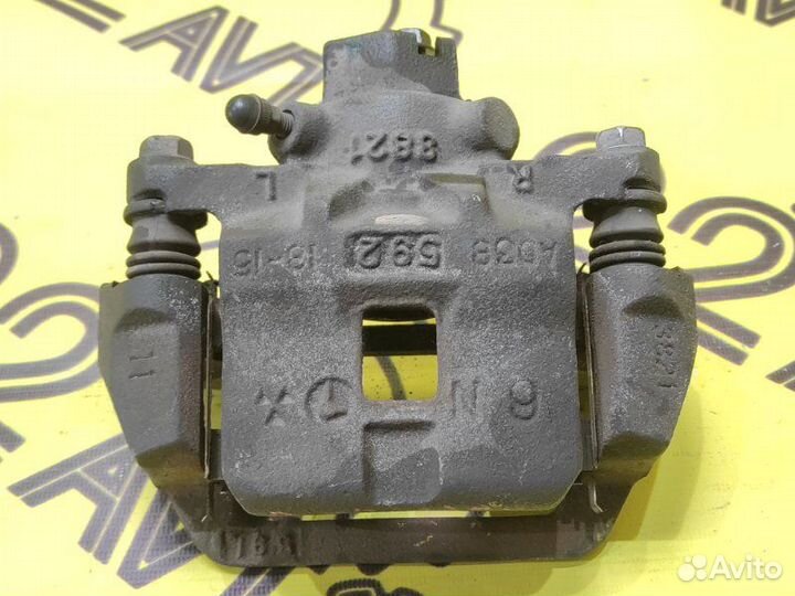 Суппорт задний левый Subaru Legacy BLE EZ30D