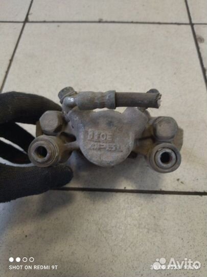 Суппорт тормозной задний левый Chery Tiggo T11