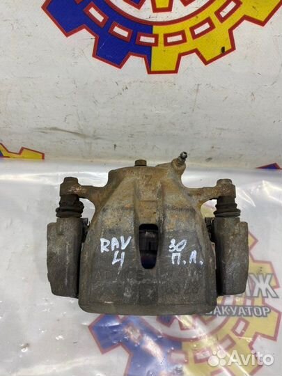 Суппорт тормозной передний левый Toyota Rav4