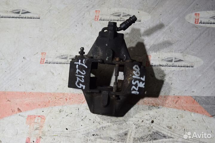 Суппорт зад лево c Toyota Aristo JZS160 2JZ-GE