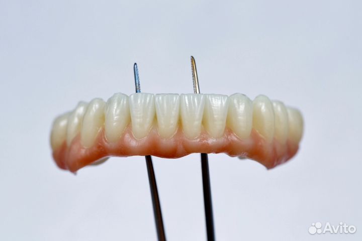 Зубной техник