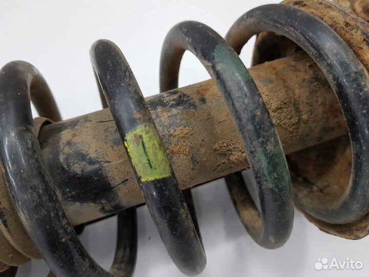 Амортизатор передний левый с пружиной (Kia Rio)